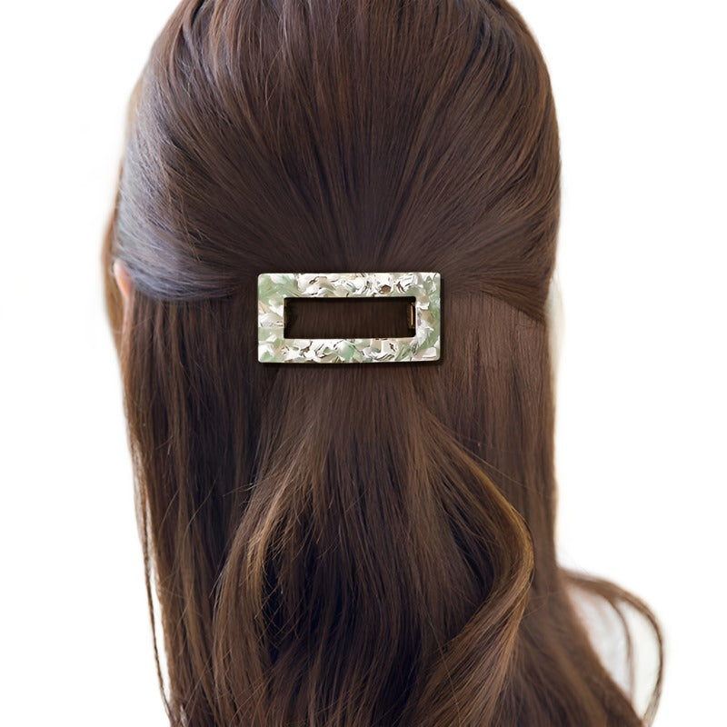 These versatile French barrettes have a flat base so they do not cause tension when holding your hair in place. Perfect for a half up half down 'do, the latch is strong enough to grip a classic groomed all day style.