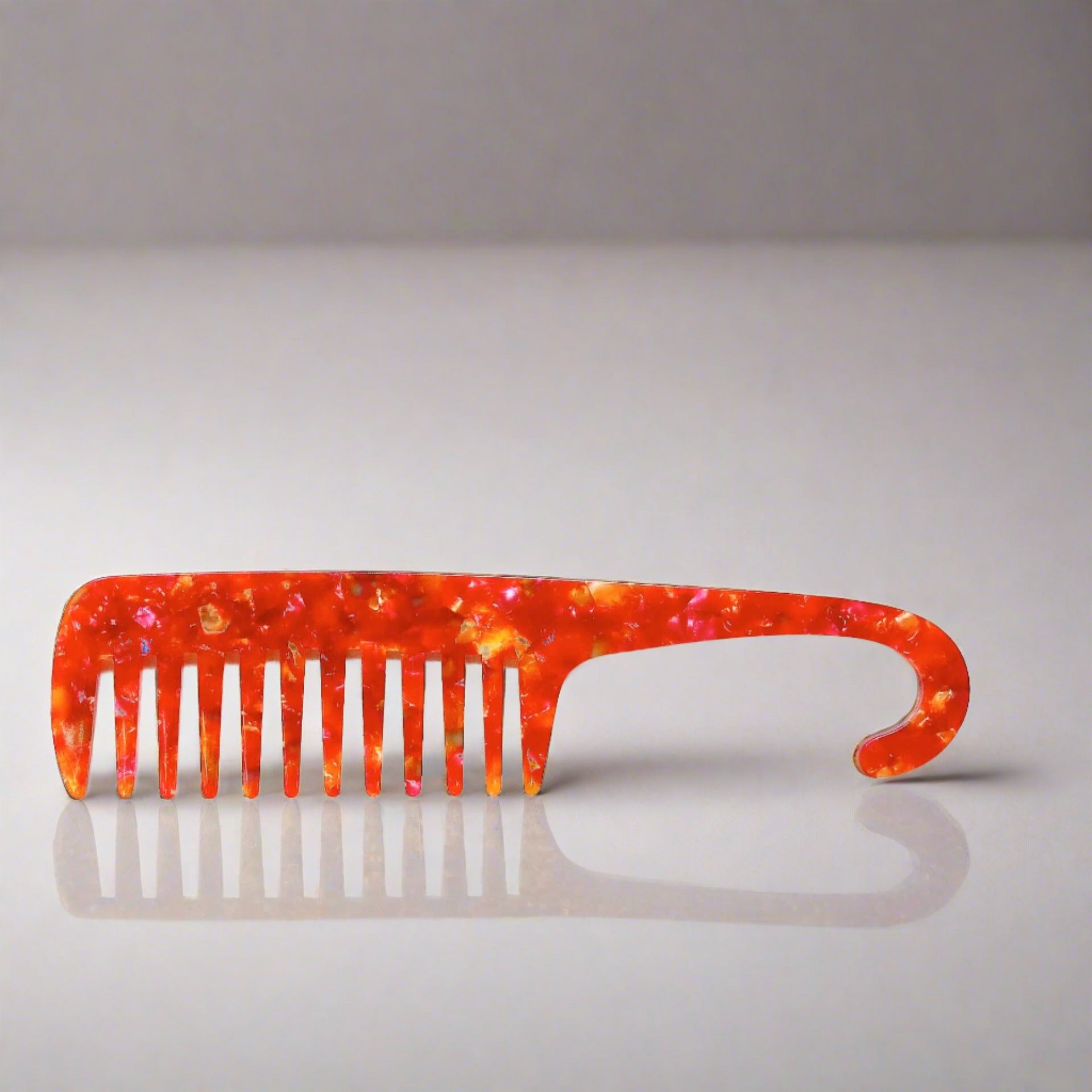 Wide tooth combs for use the bath and shower. These combs help to protect your hair and reduce damage to the strands when removing knots and tangles or working through hair conditioner
