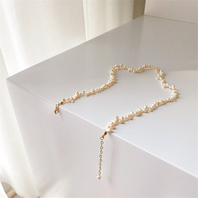 These vintage style natural freshwater pearl necklaces and bracelets are always a sweet fashion option. They have a retro beach feel and compliment all skin tones. The necklace sits at the clavicle.  Treat yourself of send someone a lovely, kind gift.