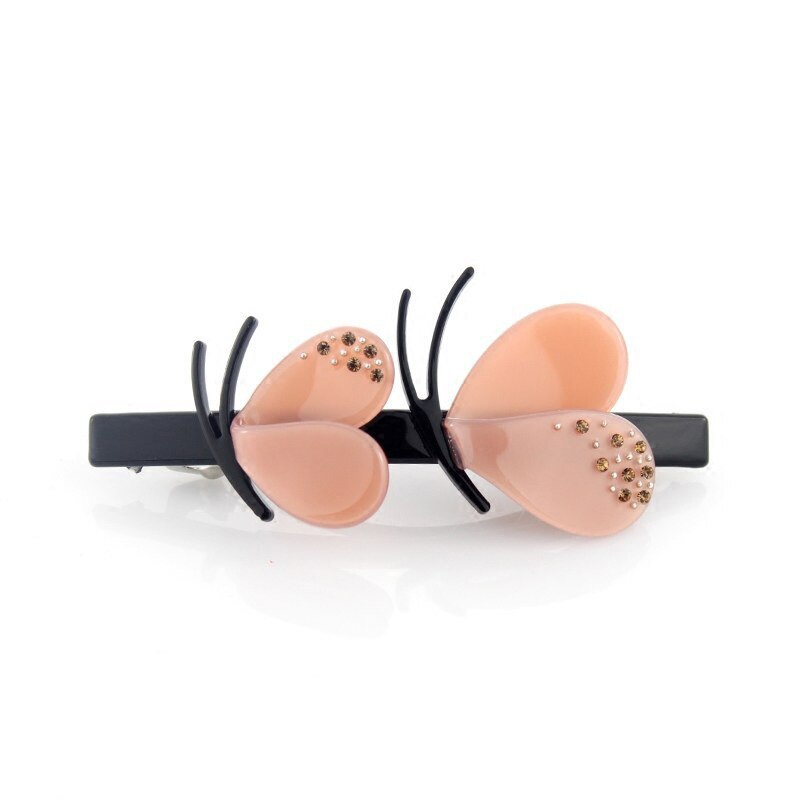 Beautiful hair barrette in double butterfly style.   Set a glamorous tone with this hair barrette clips in pink and beige.  Material: Eco-friendly/Recyclable Acetate