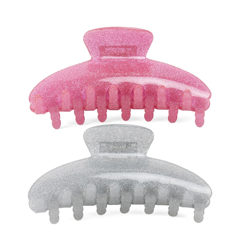 These non-slip hair barrettes are in cute jelly bean glitter colours and shapes. The wide jaw clamps pony tails and messy buns for all hair textures and mid to long lengths.